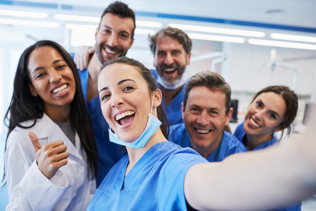 A group of healthcare professionals taking a selfie.